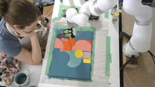 Load image into Gallery viewer, Joanne Hastie painting along with a robotic arm
